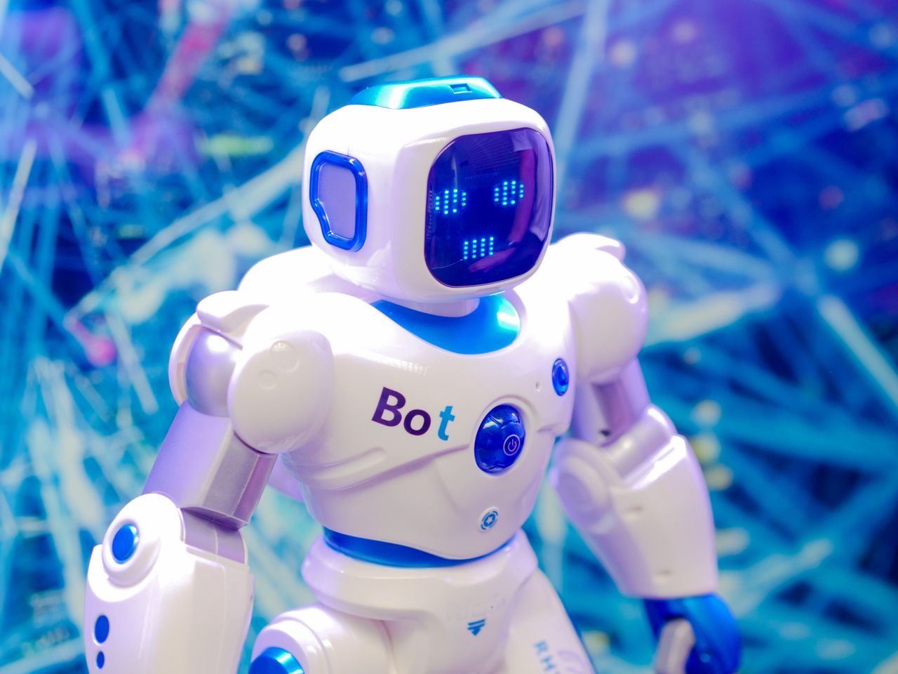 About High-tech humanoid robot with LED face display, showcasing modern robotics and innovation.