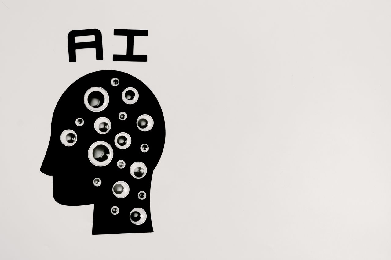 About Abstract illustration of AI with silhouette head full of eyes, symbolizing observation and technology.